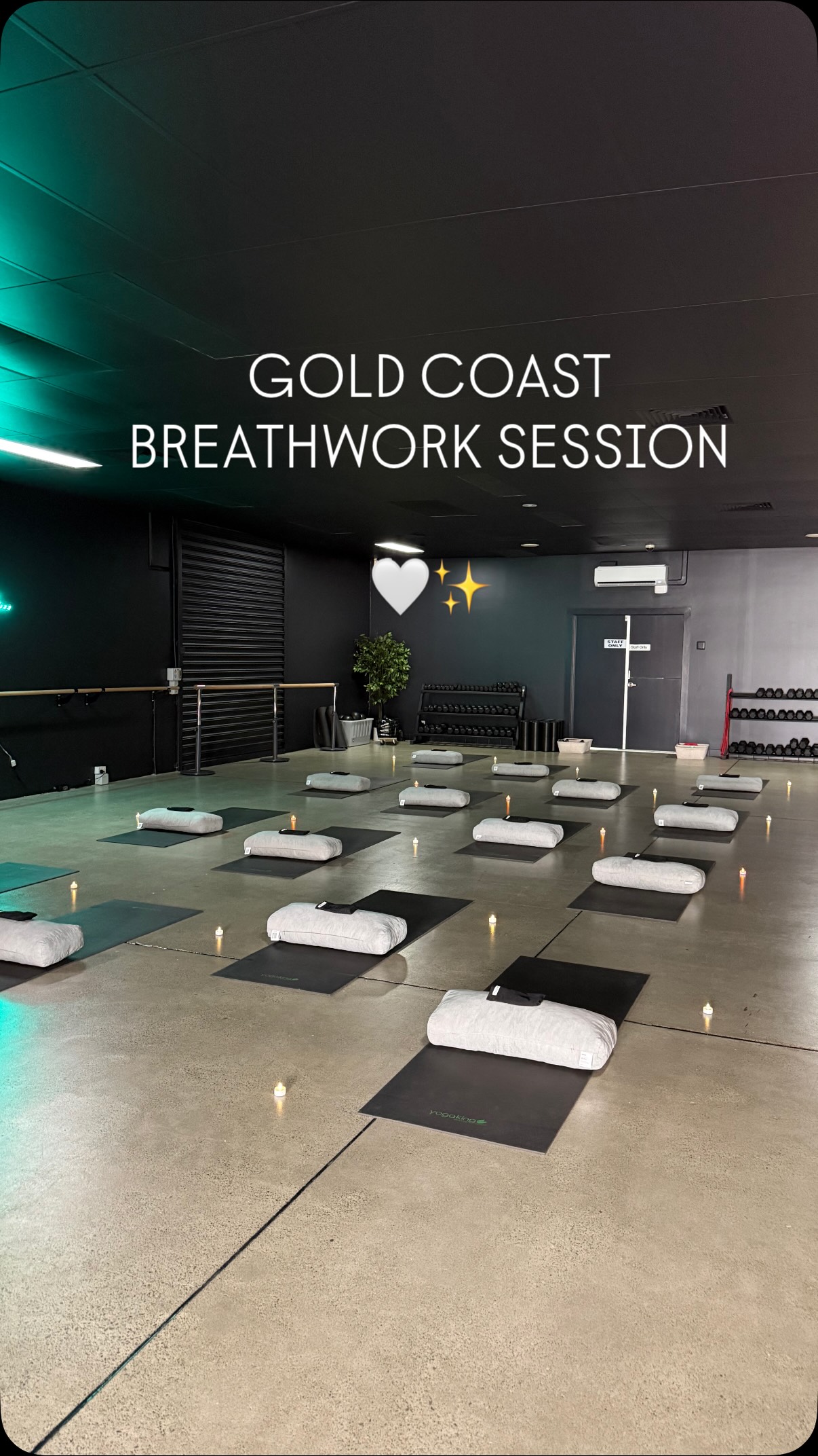 Breathwork session setup with candles and mats